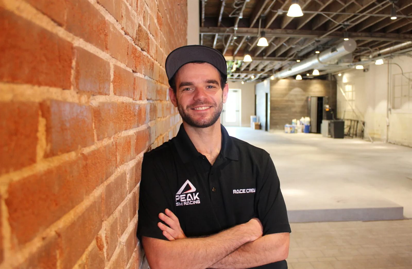 Eli Sevilla standing in the former Burns Family Artisan Ales space on South Broadway in Denver.